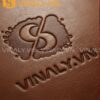 In logo Vinaly dập nổi và thêu chỉ cao cấp.
