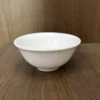 Chén sứ mắm loe 3.6 in logo màu trắng tinh tế đặt trên mặt bàn gỗ nâu, sẵn sàng làm quà tặng doanh nghiệp độc đáo.